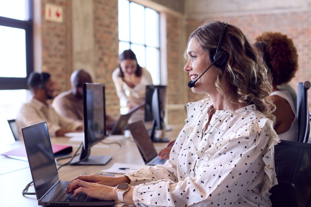 Pocus Locus Multi-Cultural Business Team Wearing Headsets Working In Customer Support Centre