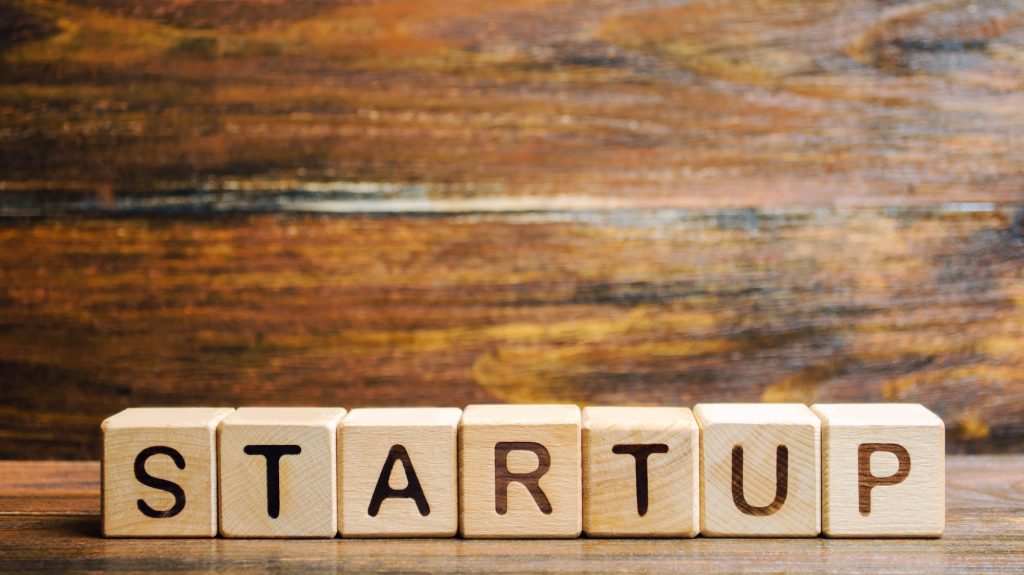 Wooden blocks with the word Startup